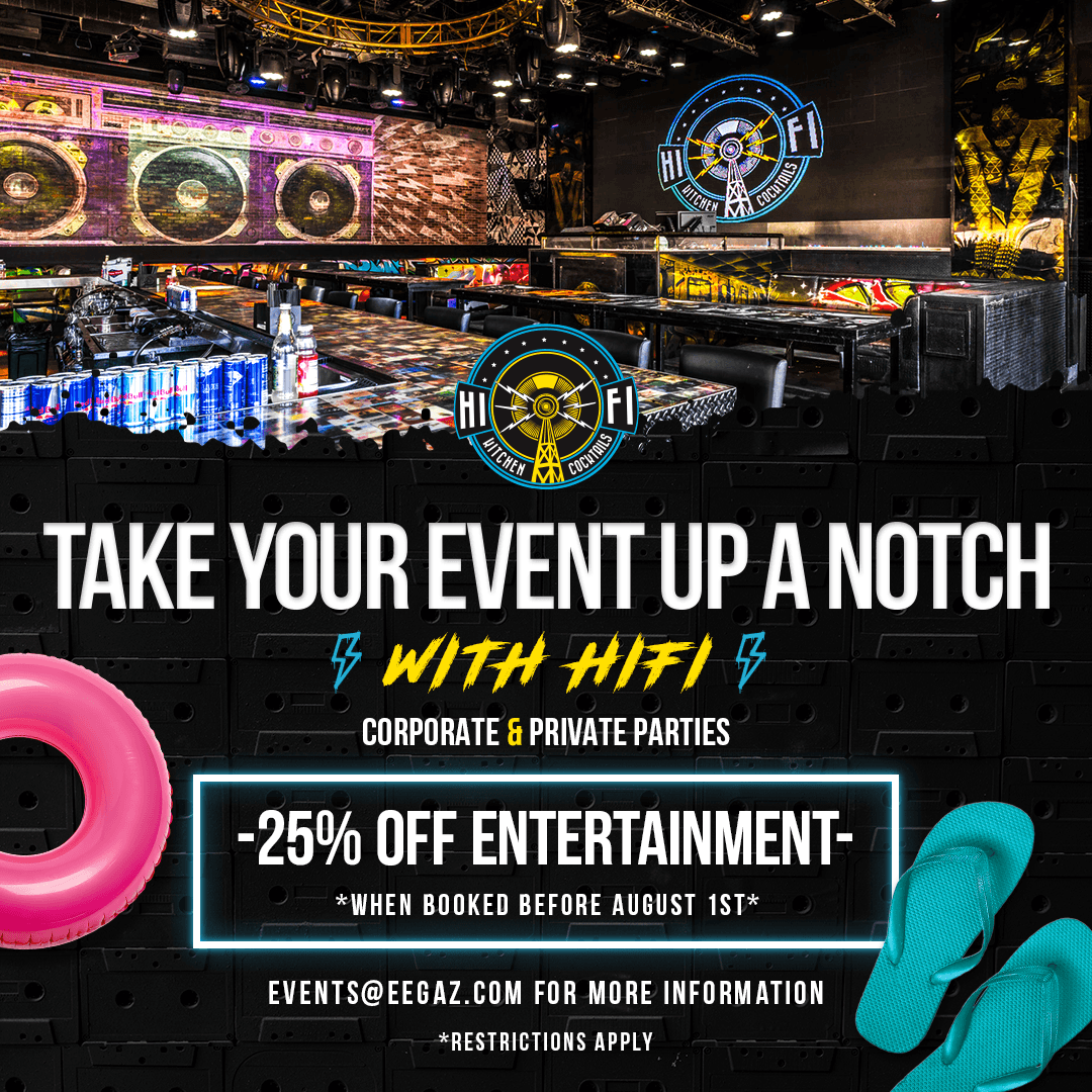 HiFi Kitchen and Cocktails venue with bar seating and event promotion signage.